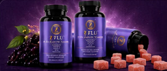 Two Z-Flu bottles with elderberries and strawberry gummies